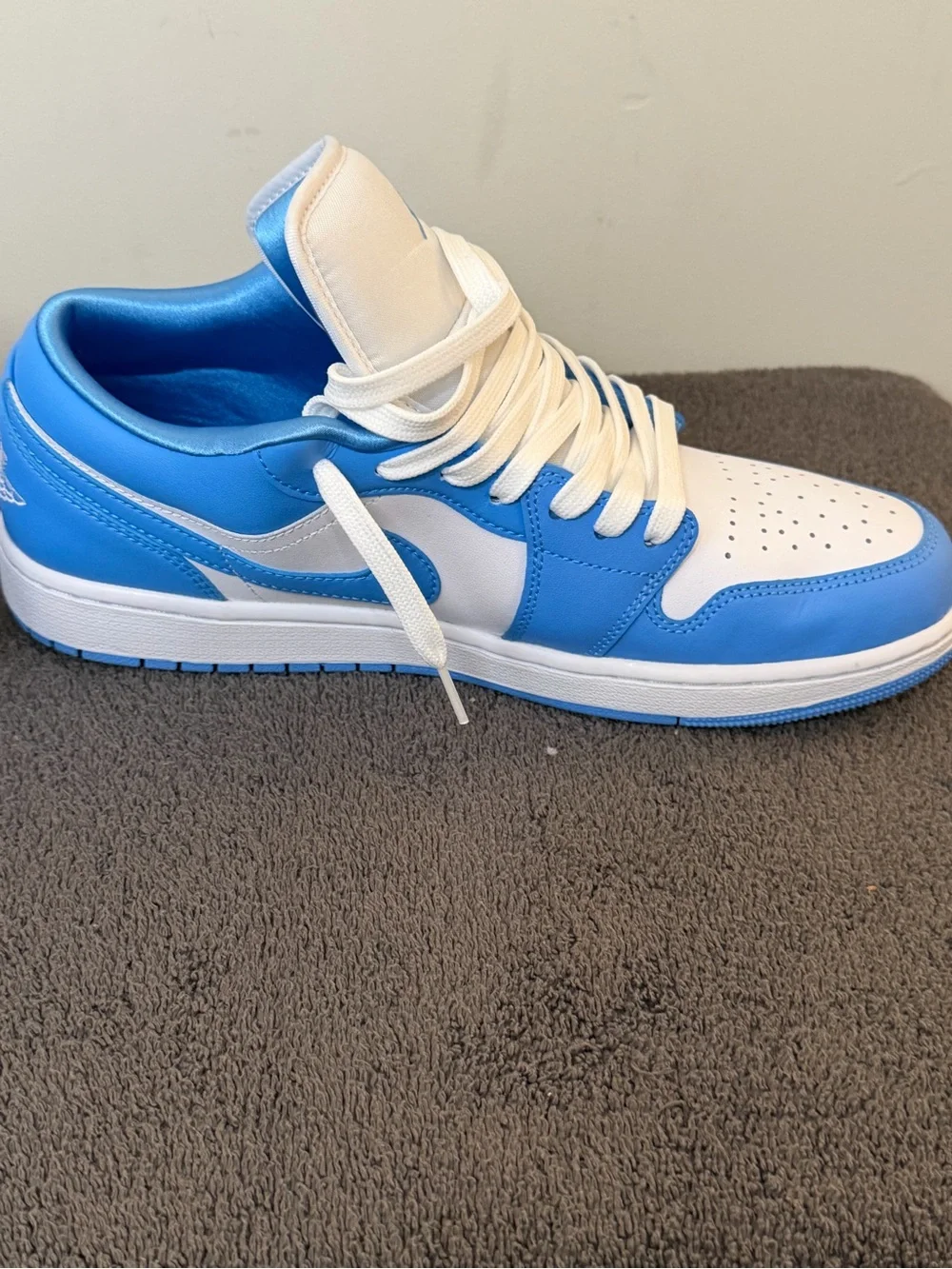 Nike Air Jordan 1 Low in men’s size 10 1/2. In the University Blue/ White